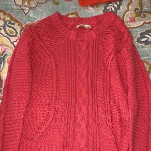 Pink knitted sweater